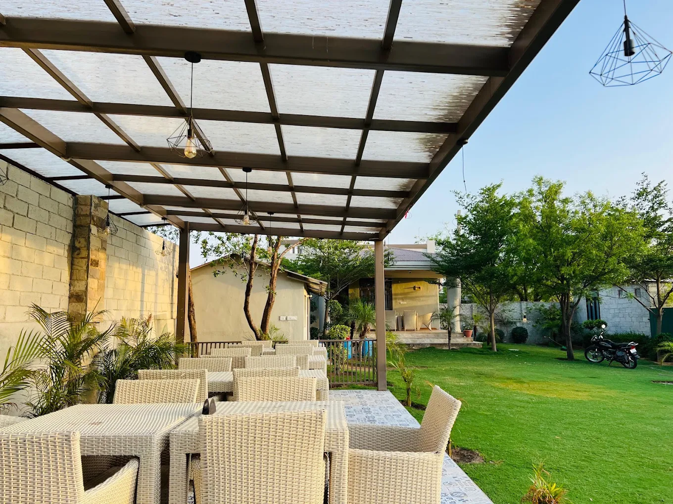 Covered outdoor seating — photograph from the property’s Google listing